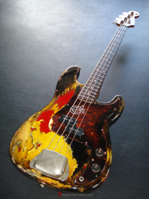 FENDER STANDARD PRICISION BASS YELLOW ON RED HEAVY RELIC AGED (SOLD)